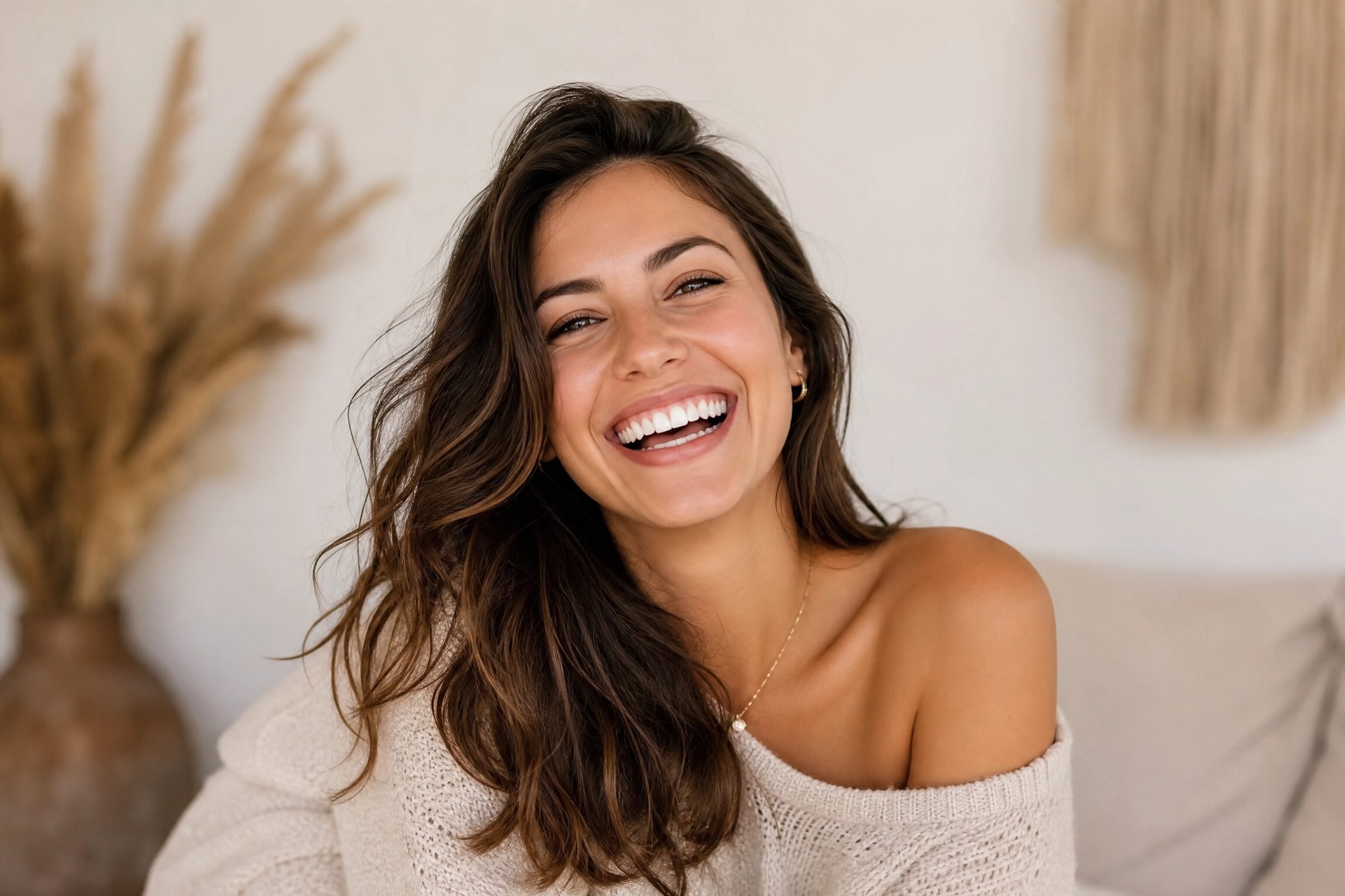 Patient with bright white smile after professional teeth whitening at Anderson Smile Center