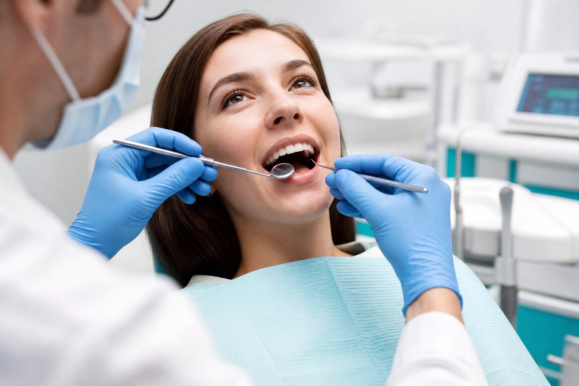 Skilled dentist performing tooth extraction procedure at Anderson Smile Center Cincinnati